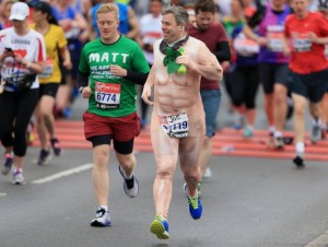 LONDON, UNITED KINGDOM - APRIL 26:  A runner dressed in a naked suit in the mass start during the Virgin Money London Marathon on April 26, 2015 in London, England. (Photo by Stephen Pond/Getty Images)