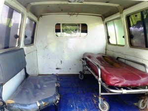 The interior of the ambulance, lacking paramedic supplies for first aid.
